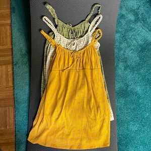 SOLD AS A SET OF 3! Arizona brand halter tops in BRAND NEW CONDITION. Size XL.